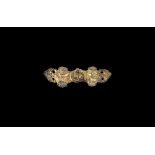 Viking Gilt Equal-Arm Brooch with Beast Heads