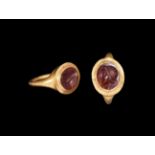 Roman Gold Child's Ring with Garnet Intaglio