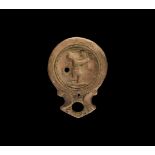 Roman Oil Lamp with Stave Thrower