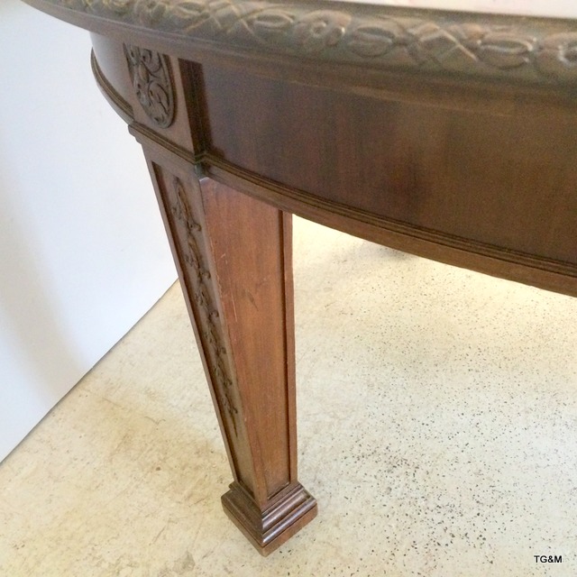 Warring and Gillows mahogany extending dining table on tapered legs with brass casters, carved - Image 10 of 10