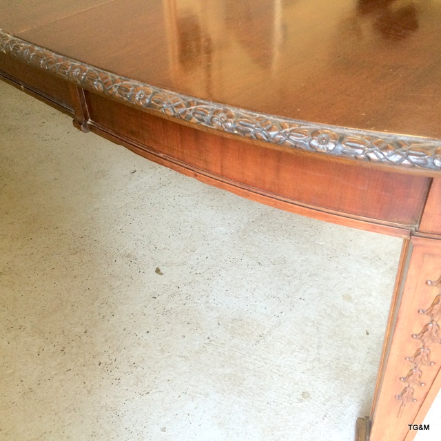 Warring and Gillows mahogany extending dining table on tapered legs with brass casters, carved - Image 8 of 10