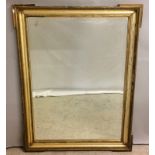 A gilt framed beveled edged pine mirror 120 x 90