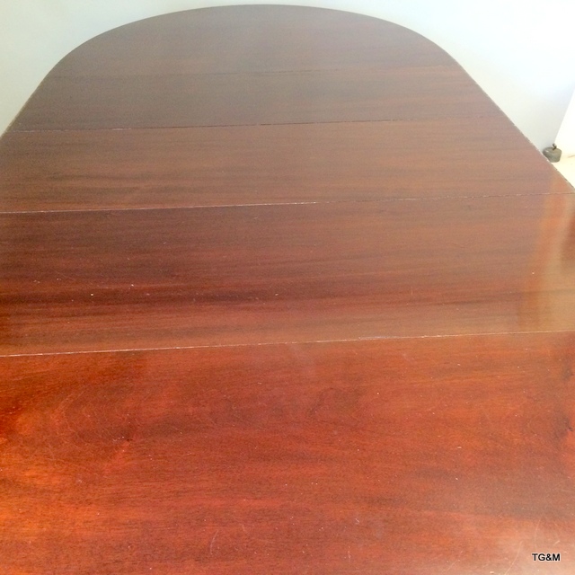 Warring and Gillows mahogany extending dining table on tapered legs with brass casters, carved - Image 7 of 10