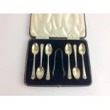 Boxed silver h/m tea spoons and sugar tongs