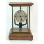 Glass cased electric clock