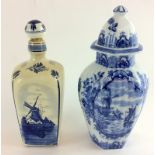 Pair of Delft urn vases with lids