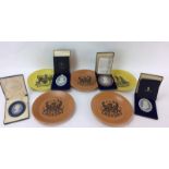 4 Wedgwood Jasper wear commemorative plaques together a collection of Heraldic dinner plates