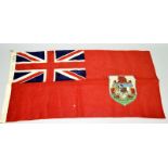 An original British Commonwealth cotton flag of Bermuda Red Ensign as used from 1910 until 1999.