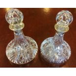 Pair silver rimmed ships decanters London 1978