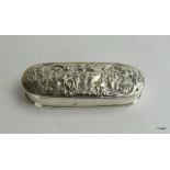 An Antique Dutch silver box with embossed decoration