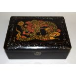 Oriental Lacquer box with dragon & snake decoration and signed to the lid