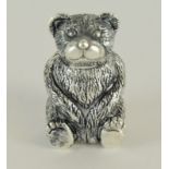 a silver plated pincushion in the form of a bear