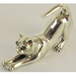 a good solid cast silver cat figure with emerald eyes