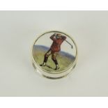 a silver and enamel lidded ball marker box depicting a golfer