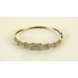 a silver Cz and bamboo shaped bracelet