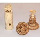 Small Chinese puzzle ball on stand and a Indian carved ivory elephant