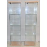 Two square display cabinets with 3 shelves 165 x 40 x 35