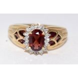 9ct gold ladies diamond and garnet cluster ring size N