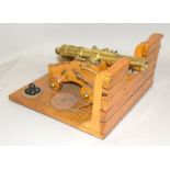 An impressive 18th century model of a deck mounted ships cannon with a barrel length of 23.5 cms and