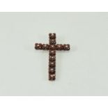 A garnet silver cross 6x4cm