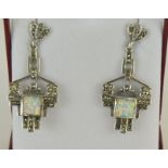 a pair of silver marcasite and opal art deco style earrings