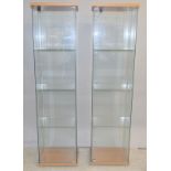 Two square display cabinets with 3 shelves 165 x 40 x 35