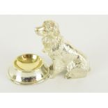 a silver plated salt container in the form of a dog