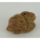 a lucky Japanese carved wooden figure of a toad