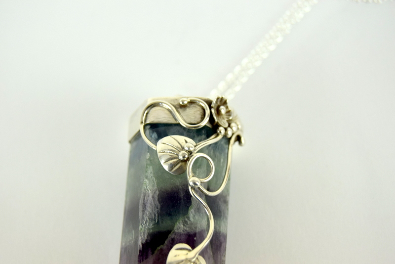 a substantial amethyst and crystal pendant necklace with silver fittings - Image 2 of 4