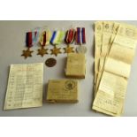 A WW2 Merchant Navy medal group of five including the Atlantic Star, his ID tag, medal paperwork,