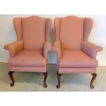 Pair Parker Knoll wing back fire side chairs