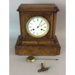 Burr walnut mantle chiming clock and key 'Rowell' Oxford on face plate 26x26x15cm