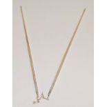 Pair of oriental white metal chop sticks