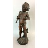 Spelter figure of a cherub with foundry mark and signed to the base 50cm tall