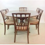 Strongbow extending mahogany dining table on single pedestal and 6 dining chairs