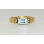 9ct gold ladies aquamarine and diamond shoulder ring size O