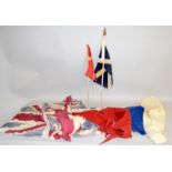 Two hand held Coronation flags with two strings of bunting