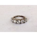 a silver and five stone cz ring