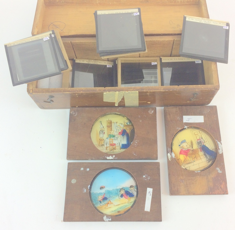 Hand painted magic lantern slides with a collection of Astro slides boxed