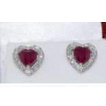 a pair of 18ct white gold heart shaped ruby and diamond earrings 2.4ct's