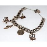 Ladies silver charm bracelet with 5 charms