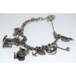 Ladies silver charm bracelet with 8 charms