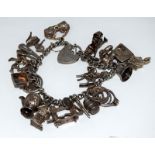 Ladies silver charm bracelet with 20 charms