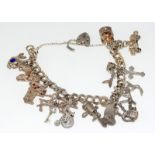 Ladies silver charm bracelet with 13 charms