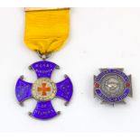 A hallmarked silver and enamel Royal Northern Hospital Guild of Helpers medal named to Mr Fred