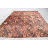 Large Terracotta coloured Afghan carpet (A/F) 230 x 170cm