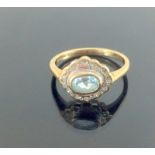 9ct gold ladies diamond and aquamarine daisy ring size J