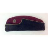 A WW2 Royal Army Medical Corps officers side cap with silver & gilt cap badge