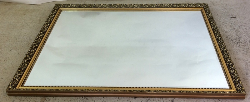 Gilt framed bevelled edged mirror. 135 x 105cm