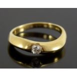 an 18ct yellow gold solitaire diamond ring